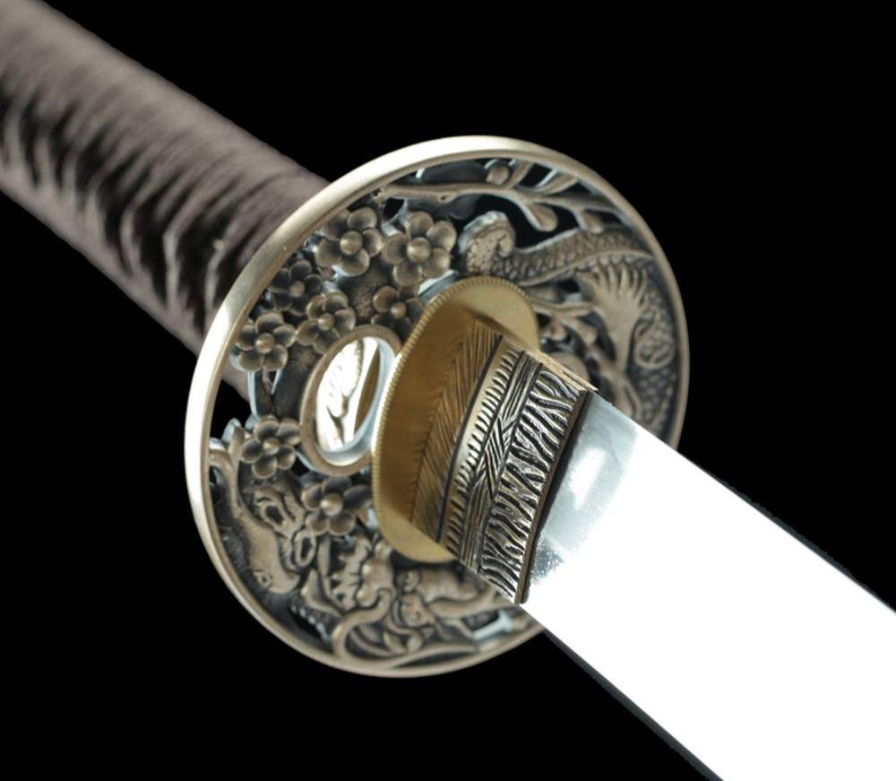 Obsidian Kin-Ryu | Hand Forged Gold Samurai Sword and Katana 1 The Obsidian Kin-Ryu hand forged samurai sword and katana featuring a black and gold dragon scabbard